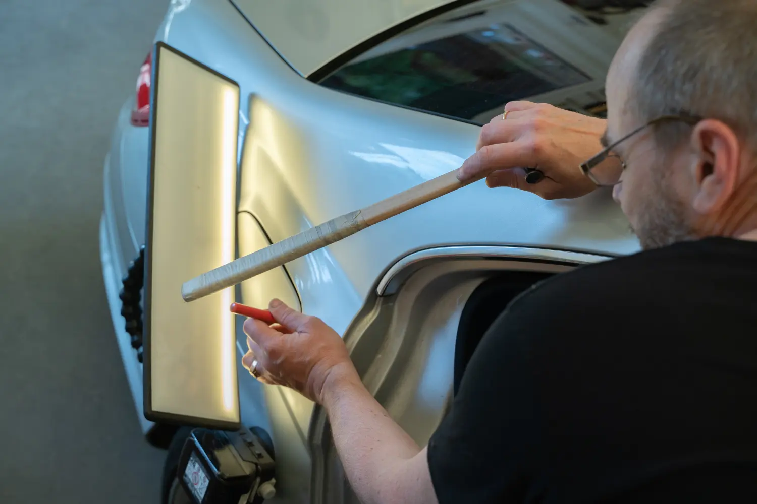 Autoreparatur Reparatur von Autobeulen